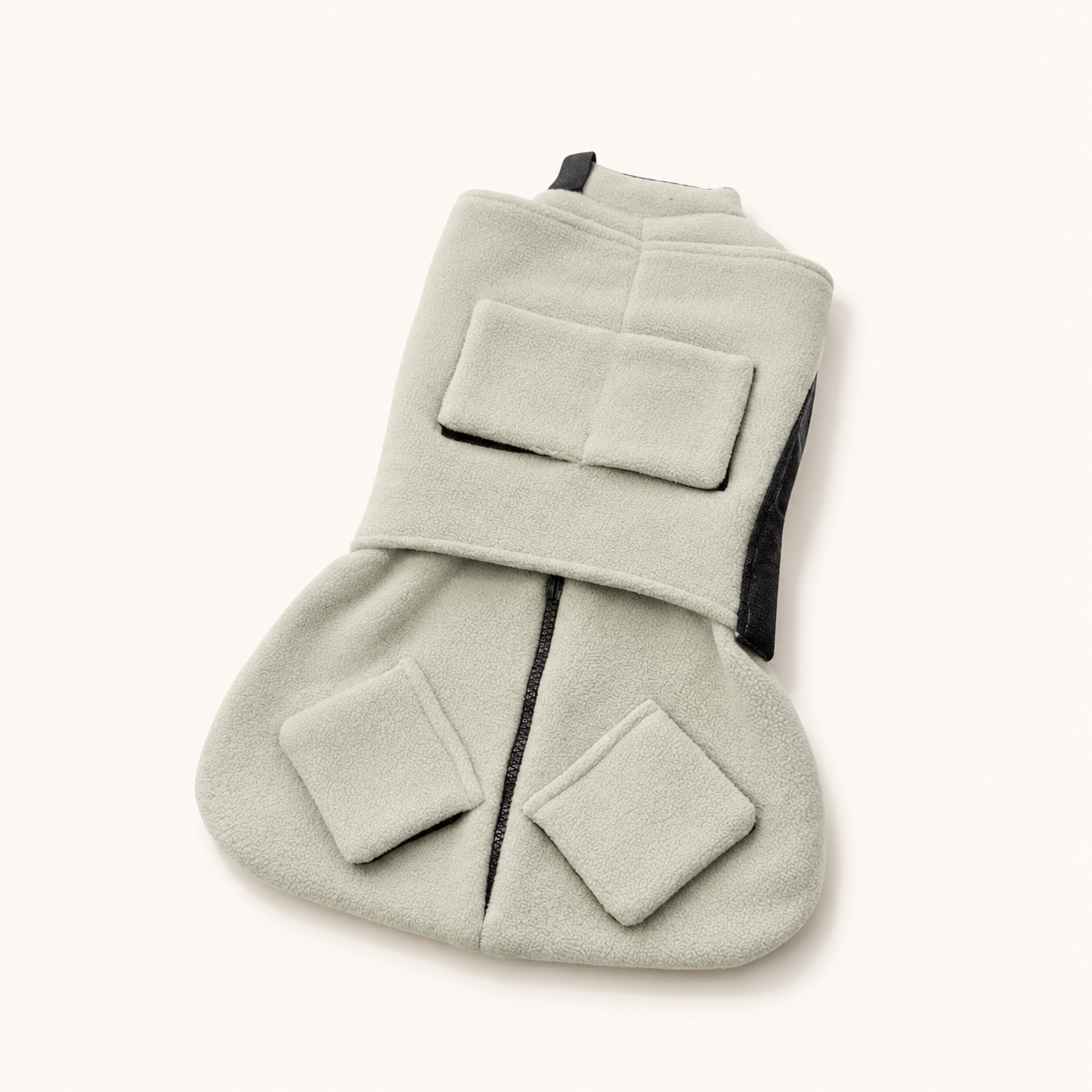 Purrttie Snug Pro Cat Wrap in grey — soft polar fleece cat grooming wrap with adjustable velcro collar and dual-head zipper, folded flat to show the calming swaddle design used for nail trims, medication, and vet visits.